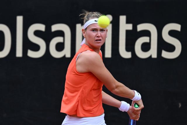 Czech Republic's Marie Bouzkova returns the ball to Hungary's Panna Udvardy during the WTA Bogota women's singles final match at the Country Club in Bogota on April 5, 2026. (Photo by RAUL ARBOLEDA / AFP)