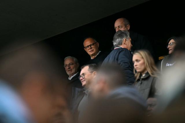 French right-wing Horizons party leader and mayor of Le Havre Edouard Philippe (C) looks on from the stand before the French L1 football match between Le Havre AC and AJ Auxerre at the Oceane Stadium in Le Havre, Normandy, on April 5, 2026. (Photo by Lou BENOIST / AFP)