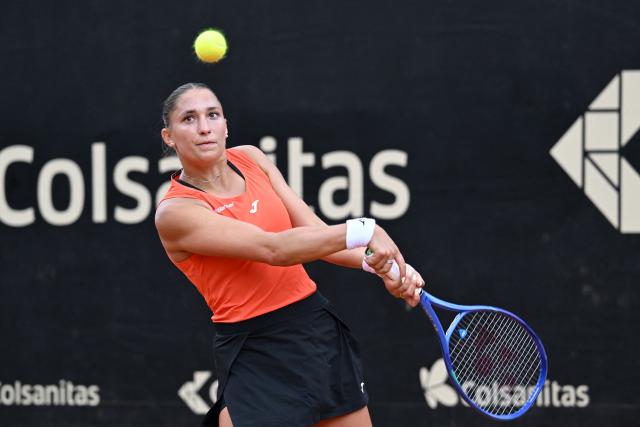 Hungary's Panna Udvardy returns the ball to Czech Republic's Marie Bouzkova during the WTA Bogota women's singles final match at the Country Club in Bogota on April 5, 2026. (Photo by RAUL ARBOLEDA / AFP)