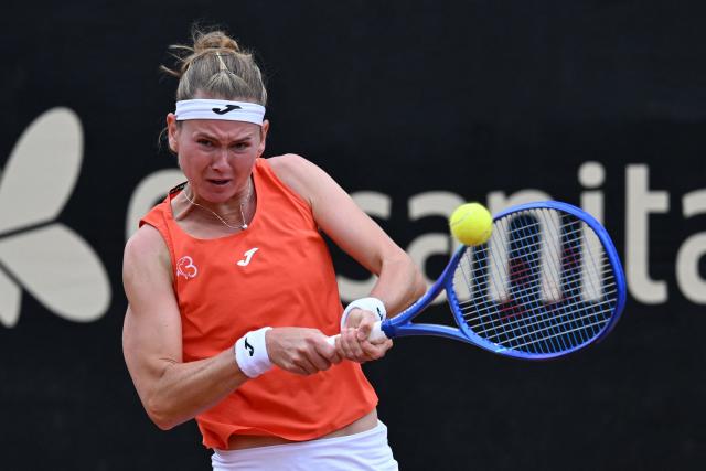 Czech Republic's Marie Bouzkova returns the ball to Hungary's Panna Udvardy during the WTA Bogota women's singles final match at the Country Club in Bogota on April 5, 2026. (Photo by RAUL ARBOLEDA / AFP)