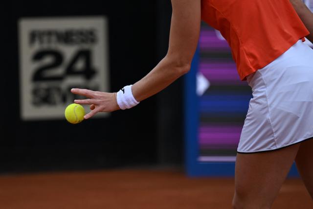 Czech Republic's Marie Bouzkova serves to Hungary's Panna Udvardy during the WTA Bogota women's singles final match at the Country Club in Bogota on April 5, 2026. (Photo by RAUL ARBOLEDA / AFP)