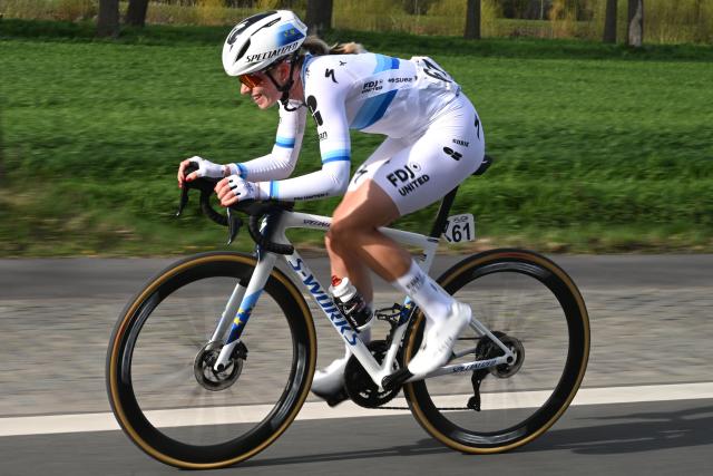 FDJ United-Suez's Dutch rider Demi Vollering cycles during the women's race of the 'Ronde van Vlaanderen/ Tour des Flandres/ Tour of Flanders' UCI WorldTour one day cycling race, 164,1 km with start and finish in Oudenaarde, on April 5, 2026. (Photo by Luc CLAESSEN / POOL / AFP) / Belgium OUT