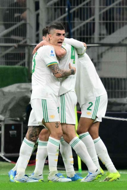 Roma's Italian defender #23 Gianluca Mancini celebrates scoring his team's first goal during the Italian Serie A football match between Inter Milan and AS Roma at San Siro stadium in Milan, on April 5, 2026. (Photo by Stefano RELLANDINI / AFP)