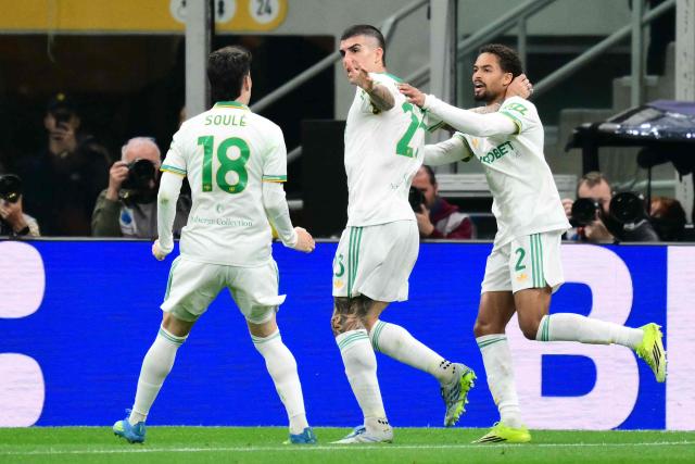 Roma's Italian defender #23 Gianluca Mancini (C) celebrates scoring his team's first goal with Roma's Argentine forward #18 Matias Soule and Roma's Dutch defender #02 Devyne Rensch during the Italian Serie A football match between Inter Milan and AS Roma at San Siro stadium in Milan, on April 5, 2026. (Photo by Stefano RELLANDINI / AFP)