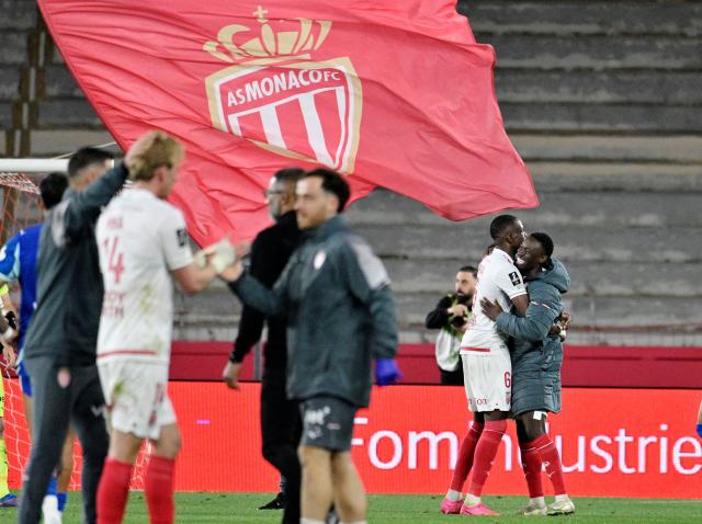 Monaco's Swiss midfielder #06 Denis Zakaria (L) and Monaco's French defender #20 Kassoum Ouattara (R) celebrate after winning the French L1 football match between Monaco (ASM) and Olympique de Marseille (OM) at the Louis II Stadium in Monaco on April 5, 2026. (Photo by Frederic DIDES / AFP)