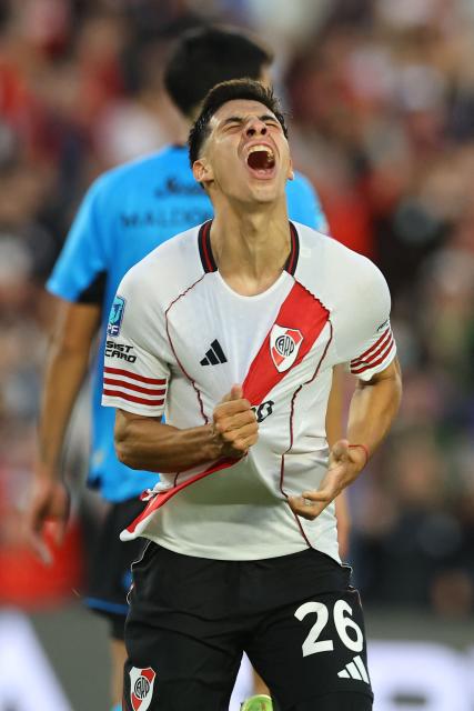 River Plate midfielder #26 Tomas Galvan celebrates after scoring the first goal during the Argentine Professional Football League 2026 Apertura Tournament match between River Plate and Belgrano at MAS Monumental stadium in Buenos Aires on April 5, 2026. (Photo by ALEJANDRO PAGNI / AFP)