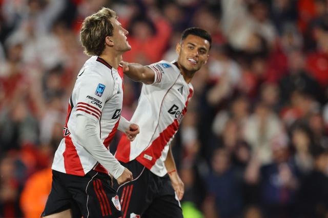 River Plate's forward #11 Facundo Collidio (L) celebrates scoring his team's second goal during the Argentine Professional Football League 2026 Apertura Tournament match between River Plate and Belgrano at MAS Monumental stadium in Buenos Aires on April 5, 2026. (Photo by ALEJANDRO PAGNI / AFP)