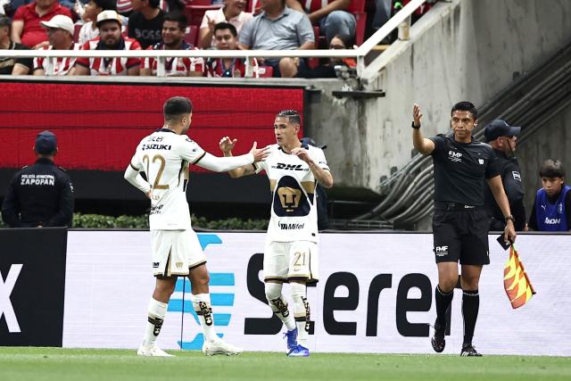 Pumas' midfielder #21 Uriel Antuna (C) celebrates scoring his team's first goal during the Liga MX Clausura football match between Guadalajara and Pumas at Akron stadium in Zapopan, Jalisco state, Mexico, on April 5, 2026. (Photo by Ulises Ruiz / AFP)