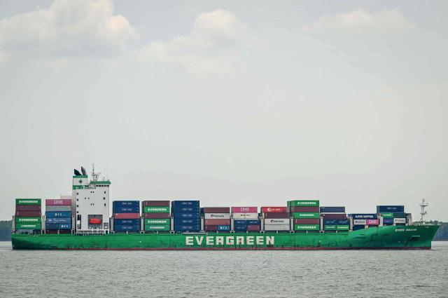 A cargo ship sails toward Malaysia's North Klang port in Port Klang, on the outskirts of Kuala Lumpur on April 6, 2026. (Photo by Mohd RASFAN / AFP)