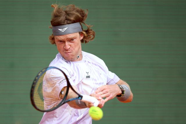 Russia's Andrey Rublev plays a forehand return to Portugal's Nuno Borges during the Monte Carlo ATP Masters Series Tournament round of 64 tennis match on Court Rainier III at the Monte-Carlo Country Club in Roquebrune-Cap-Martin, south-eastern France on April 6, 2026. (Photo by Valery HACHE / AFP)