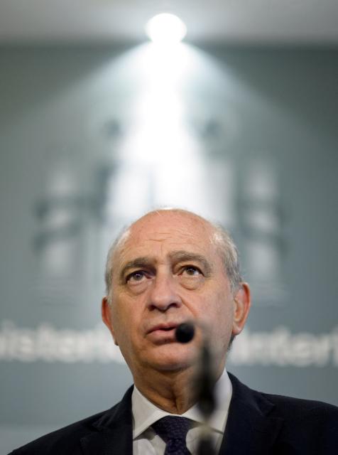 (FILES) Then Spain's Interior Minister Jorge Fernandez Diaz speaks during a press conference held after an urgent meeting at the Ministry of Interior, in Madrid on June 26, 2015. The trial of former Spanish Interior Minister Jorge Fernandez Diaz starts on April 6, 2026 to answer for an alleged operation to prevent a former treasurer of his party - Spanish right-wing Partido Popular (Popular Party-PP)- from exposing corrupt practices. (Photo by DANI POZO / AFP)