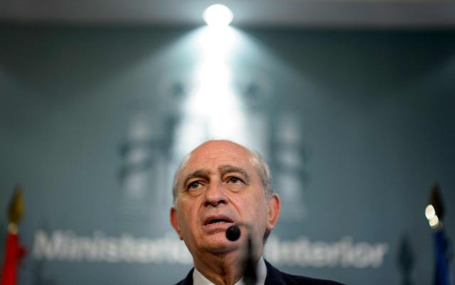 (FILES) Then Spain's Interior Minister Jorge Fernandez Diaz speaks during a press conference held after an urgent meeting at the Ministry of Interior, in Madrid on June 26, 2015. The trial of former Spanish Interior Minister Jorge Fernandez Diaz starts on April 6, 2026 to answer for an alleged operation to prevent a former treasurer of his party - Spanish right-wing Partido Popular (Popular Party-PP)- from exposing corrupt practices. (Photo by DANI POZO / AFP)