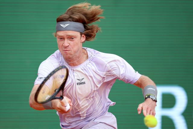 Russia's Andrey Rublev plays a forehand return to Portugal's Nuno Borges during the Monte Carlo ATP Masters Series Tournament round of 64 tennis match on Court Rainier III at the Monte-Carlo Country Club in Roquebrune-Cap-Martin, south-eastern France on April 6, 2026. (Photo by Valery HACHE / AFP)