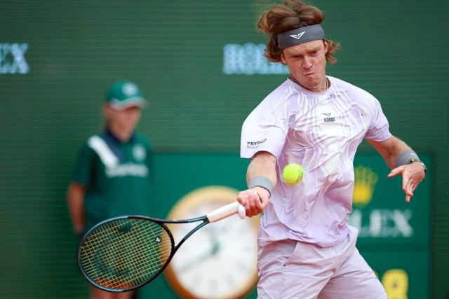 Russia's Andrey Rublev plays a forehand return to Portugal's Nuno Borges during the Monte Carlo ATP Masters Series Tournament round of 64 tennis match on Court Rainier III at the Monte-Carlo Country Club in Roquebrune-Cap-Martin, south-eastern France on April 6, 2026. (Photo by Valery HACHE / AFP)
