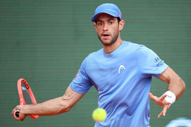 Portugal's Nuno Borges plays a forehand return to Russia's Andrey Rublev during the Monte Carlo ATP Masters Series Tournament round of 64 tennis match on Court Rainier III at the Monte-Carlo Country Club in Roquebrune-Cap-Martin, south-eastern France on April 6, 2026. (Photo by Valery HACHE / AFP)