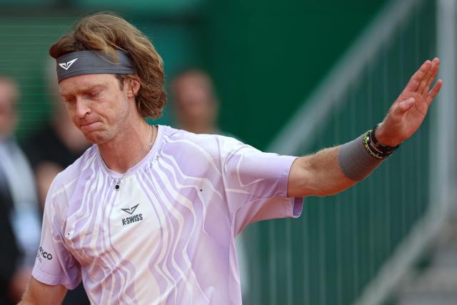 Russia's Andrey Rublev reacts as he plays against Portugal's Nuno Borges during the Monte Carlo ATP Masters Series Tournament round of 64 tennis match on Court Rainier III at the Monte-Carlo Country Club in Roquebrune-Cap-Martin, south-eastern France on April 6, 2026. (Photo by Valery HACHE / AFP)