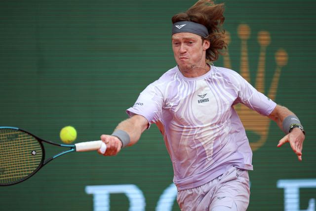 Russia's Andrey Rublev plays a backhand return to Portugal's Nuno Borges during the Monte Carlo ATP Masters Series Tournament round of 64 tennis match on Court Rainier III at the Monte-Carlo Country Club in Roquebrune-Cap-Martin, south-eastern France on April 6, 2026. (Photo by Valery HACHE / AFP)