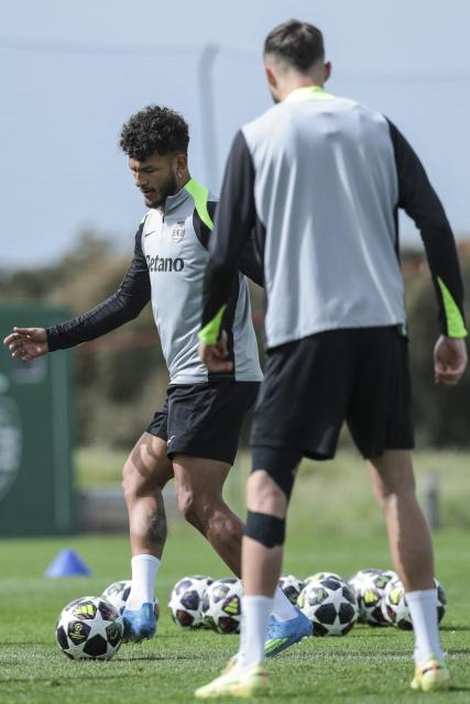 Sporting’s Colombian forward #97 Luis Suarez (L) and teammates attend a training session on the eve of their UEFA Champions League quarter final first leg football match against Arsenal, in Alcochete, outskirts of Lisbon on April 6, 2026. (Photo by PATRICIA DE MELO MOREIRA / AFP)
