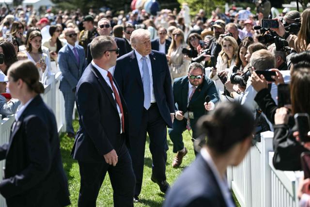 US President Donald Trump speaks to reporters as he hosts the annual Easter Egg Roll on the South Lawn of the White House on April 6, 2026, in Washington, DC. (Photo by Brendan SMIALOWSKI / AFP)