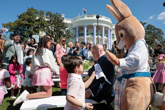 US President Donald Trump speaks with children as he hosts the annual Easter Egg Roll on the South Lawn of the White House on April 6, 2026, in Washington, DC. (Photo by Kent Nishimura / AFP)