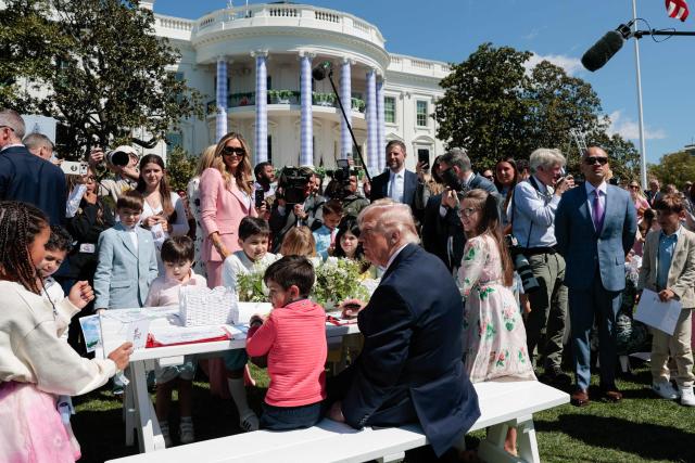 US President Donald Trump speaks with children as he hosts the annual Easter Egg Roll on the South Lawn of the White House on April 6, 2026, in Washington, DC. (Photo by Kent Nishimura / AFP)