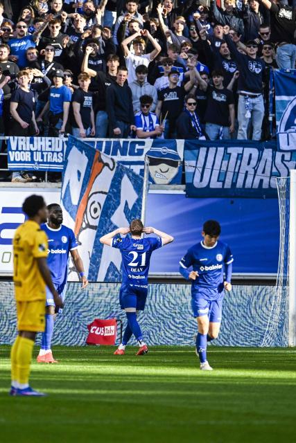 Gent's English forward #21 Max Dean celebrates scoring his team's first goal during the Belgian "Pro League" First Division football match between KAA Gent and KV Mechelen at the KAA Stadium in Ghent on April 6, 2026. (Photo by Tom Goyvaerts / BELGA / AFP) / Belgium OUT