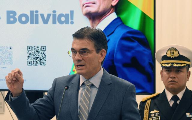 Bolivia's President Rodrigo Paz speaks during a press conference after the government revoked decrees on direct contracting and the awarding of public works contracts, at the Casa Grande del Pueblo, the seat of the Government Palace, on April 6, 2026, (Photo by Aizar RALDES / AFP)