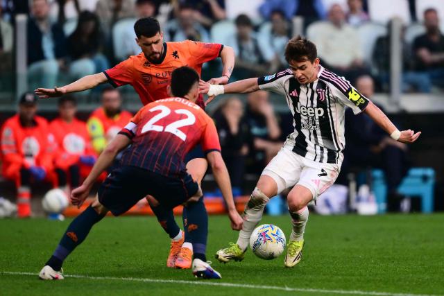 Juventus' Portuguese forward #07 Francisco Chico Conceicao fights for the ball with Genoa's Mexican defender #22 Johan Vazquez and Genoa's Spanish defender #03 Aaron Martin during the Italian Serie A football match between Juventus and Genoa at the Allianz stadium in Turin, on April 6, 2026. (Photo by Marco BERTORELLO / AFP)