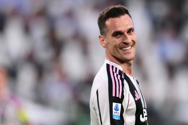 Juventus' Polish forward #14 Arkadiusz Milik smiles during the Italian Serie A football match between Juventus and Genoa at the Allianz stadium in Turin, on April 6, 2026. (Photo by Marco BERTORELLO / AFP)
