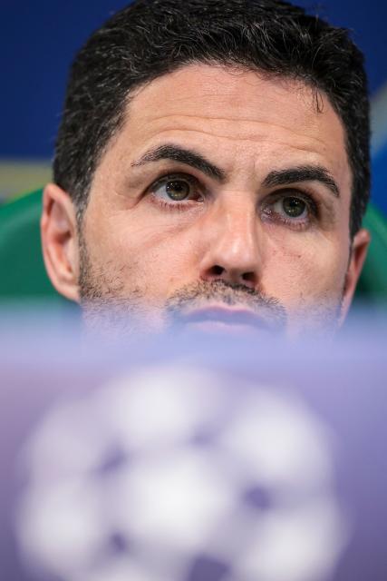 Arsenal’s coach  Mikel Arteta attends a press conference on the eve of the UEFA Champions League quarter final first leg football match against Sporting Lisbon, at Alvalade stadium in Lisbon, on April 6, 2026. (Photo by PATRICIA DE MELO MOREIRA / AFP)