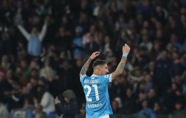 Napoli's Italian forward #21 Matteo Politano celebrates after scoring Napoli's first goal during the Italian Serie A football match between SSC Napoli and AC Milan at the Diego Armando Maradona Stadium in Naples on April 6, 2026. (Photo by CARLO HERMANN / AFP)