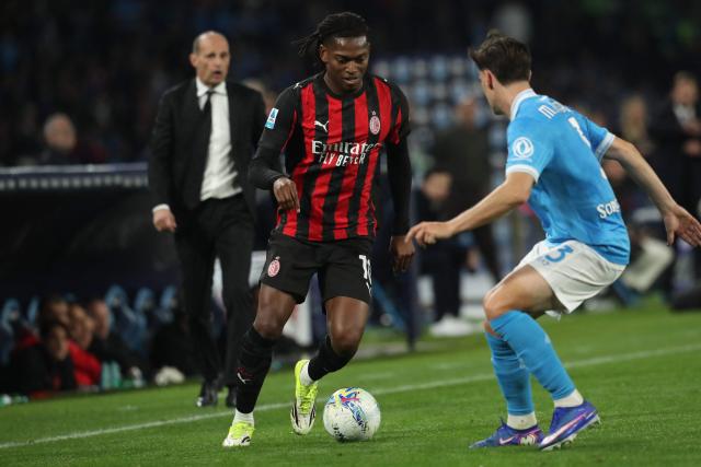 Milan's Portuguese forward #10 Rafael Leao (C) runs with the ball during the Italian Serie A football match between SSC Napoli and AC Milan at the Diego Armando Maradona Stadium in Naples on April 6, 2026. (Photo by CARLO HERMANN / AFP)