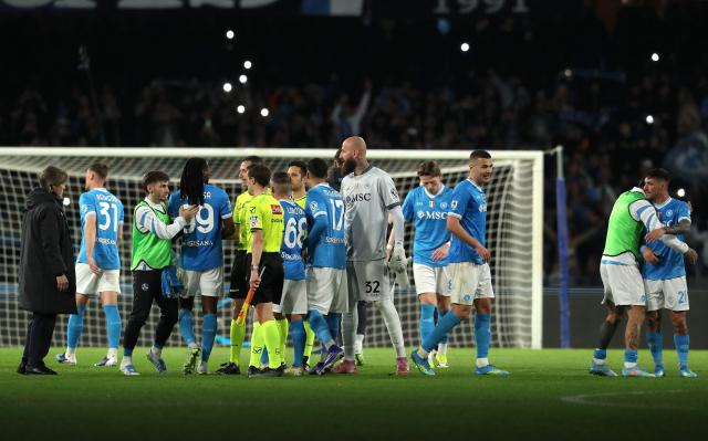 Napoli's players celebrate their victory at the end of the Italian Serie A football match between SSC Napoli and AC Milan at the Diego Armando Maradona Stadium in Naples on April 6, 2026. (Photo by CARLO HERMANN / AFP)