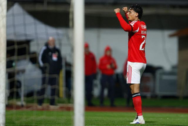 SL Benfica's Colombian midfielder #20 Richard Rios celebrates scoring the opening goal during the Portuguese League football match between Casa Pia AC and SL Benfica at Rio Maior Municipal Stadium on April 6, 2026. (Photo by FILIPE AMORIM / AFP)