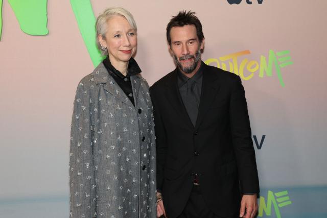 Alexandra Grant and Canadian actor Keanu Reeves attend the premiere of Apple's "Outcome" in New York City on April 6, 2026. (Photo by ANGELA WEISS / AFP)