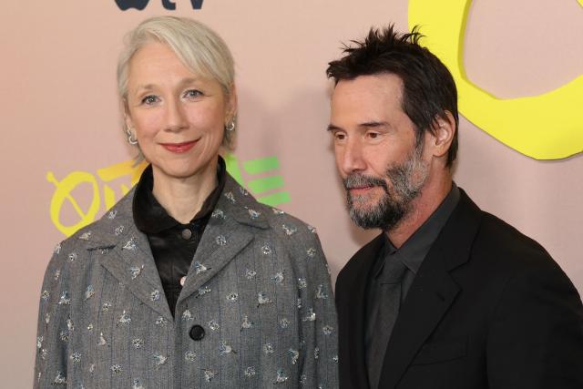 Alexandra Grant and Canadian actor Keanu Reeves attend the premiere of Apple's "Outcome" in New York City on April 6, 2026. (Photo by ANGELA WEISS / AFP)