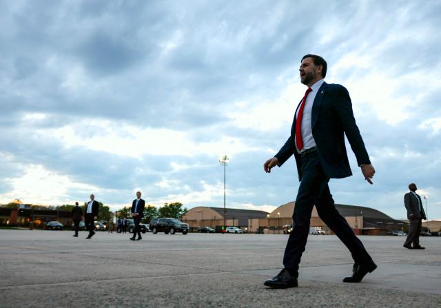 US Vice President JD Vance walks to board Air Force Two to depart for Budapest, Hungary from Joint Base Andrews, Maryland, on April 6, 2026. Vance is set to visit Budapest on Tuesday and hold a rally with Hungarian Prime Minister Viktor Orban. (Photo by Jonathan Ernst / POOL / AFP)