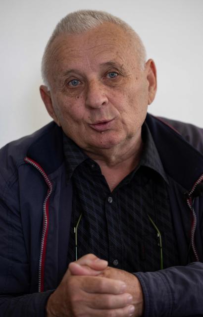 Juraj Pievac (70) speaks to a journalist at his house near the place where he was injured by a mine explosion, in the village of Brodani near Karlovac on March 24, 2026. More than 30 years after the independence war, that left behind around 107,000 landmines and 470,000 unexploded ordnances, Croatia is declared mine-free, a historic milestone for the country. (Photo by MARKO PERKOV / AFP)