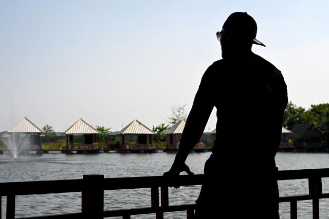 Cambodian Pheap Rom poses for picture at a restaurant in Phnom Penh on March 30, 2026. A Cambodian refugee long-settled in the United States, ex-convict Pheap Rom, remains bewildered at how he wound up behind bars in the African nation of Eswatini for months after being swept up in Donald Trump's deportation blitz. (Photo by TANG CHHIN Sothy / AFP) / To go with 'Cambodia-Eswatini-US-Migrants-Rights-Crime' Focus by Suy Se and Matt Surrusco