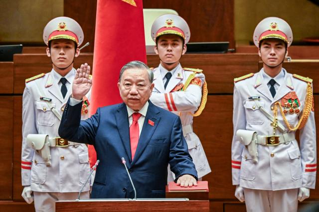 General Secretary of the Communist Party of Vietnam To Lam takes his oath as Vietnam's President during a National Assembly's session in Hanoi on April 7, 2026. Vietnam Communist Party boss To Lam was elected president by the National Assembly on April 7, capping his bid to centralise authority in a nation where senior cadres have traditionally governed collectively. (Photo by Dang ANH / AFP)