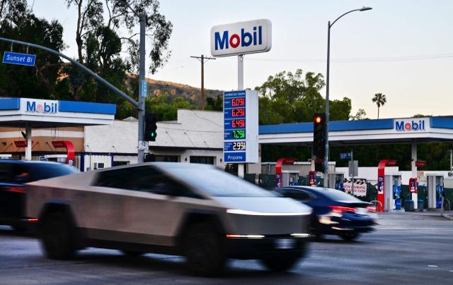 Gas prices topping $6 a gallon are displayed at a Mobil gas station on Sunset Boulevard in Los Angeles on April 6, 2026. (Photo by Frederic J. BROWN / AFP)