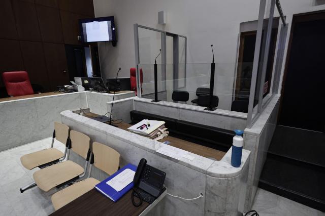 This photograph shows a view of the defendant's box at the courthouse ahead of the trial for embezzlement of former mayor of Levallois-Perret Patrick Balkany in Nanterre, west of Paris, on April 7, 2026. (Photo by STEPHANE DE SAKUTIN / AFP)