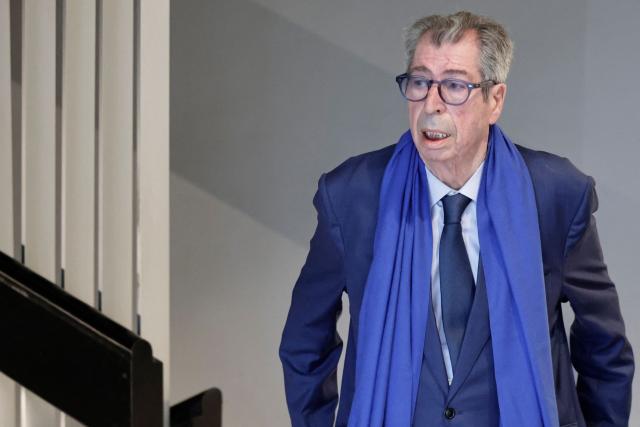 Former mayor of Levallois-Perret Patrick Balkany arrives at the courthouse for his trial for embezzlement in Nanterre, west of Paris, on April 7, 2026. (Photo by STEPHANE DE SAKUTIN / AFP)