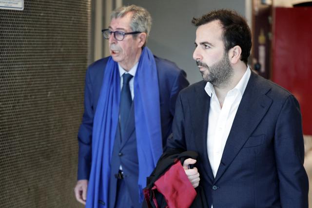 Defendant and former mayor of Levallois-Perret Patrick Balkany (L) arrives with his lawyer Robin Binsard for his the trial for embezzlement in Nanterre west of Paris, on April 7, 2026. (Photo by STEPHANE DE SAKUTIN / AFP)