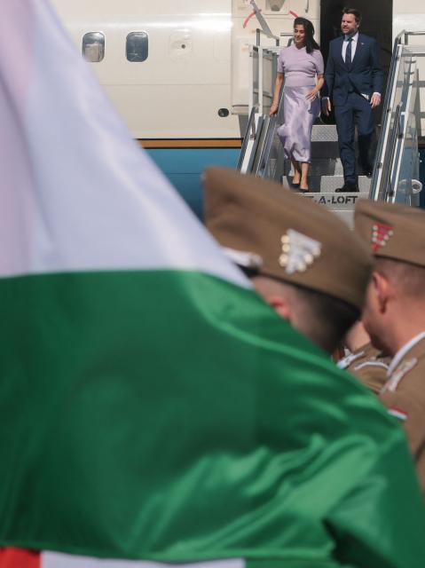 US Vice President JD Vance and his wife US second lady Usha Vance disembark Air Force Two as they arrive at Budapest Ferenc Liszt International Airport in Budapest, Hungary, April 7, 2026. US Vice President JD Vance arrived in Hungary to deliver US President Donald Trump's support to his ally, nationalist Prime Minister Viktor Orban, ahead of tightly contested parliamentary elections scheduled for April 12, 2026. (Photo by Jonathan Ernst / POOL / AFP)