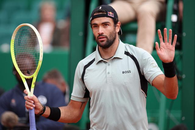 Italy's Matteo Berrettini reacts after winning against Spain's Roberto Bautista Agut following his retirement during the Monte Carlo ATP Masters Series Tournament round of 64 tennis match on Court Rainier III at the Monte-Carlo Country Club in Roquebrune-Cap-Martin, south-eastern France on April 7, 2026. (Photo by Valery HACHE / AFP)