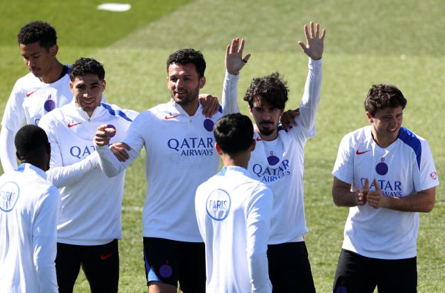 (from L) Paris Saint-Germain's Moroccan defender #02 Achraf Hakimi, Paris Saint-Germain's Portuguese forward #9 Goncalo Ramos, Paris Saint-Germain's Portuguese midfielder #17 Vitinha and Paris Saint-Germain's Portuguese midfielderr #87 Joao Neves attend a training session at the Campus Paris Saint-Germain in Poissy, in the western outskirts of Paris, on April 7, 2026, on the eve of the UEFA Champions League last 8 first leg football match between Paris Saint-Germain and Liverpool. (Photo by FRANCK FIFE / AFP)