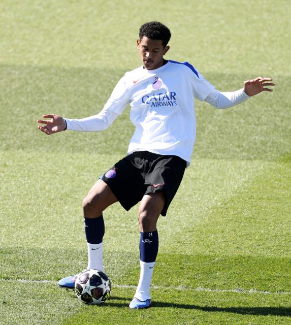 Paris Saint-Germain's French midfielderr #24 Sennay Mayulu passes the ball during a training session at the Campus Paris Saint-Germain in Poissy, in the western outskirts of Paris, on April 7, 2026, on the eve of the UEFA Champions League last 8 first leg football match between Paris Saint-Germain and Liverpool. (Photo by FRANCK FIFE / AFP)
