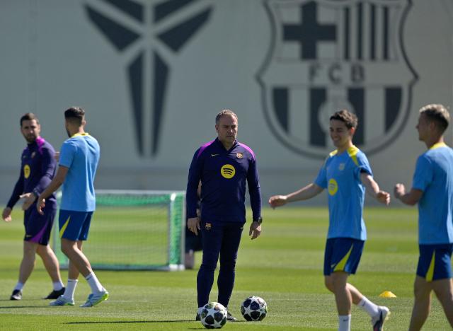 Barcelona's German coach Hans-Dieter Flick leads a training session on the eve of their UEFA Champions League quarter final football match against Club Atletico de Madrid at the Joan Gamper training ground in Sant Joan Despi, near Barcelona, on April 7, 2026. (Photo by MANAURE QUINTERO / AFP)