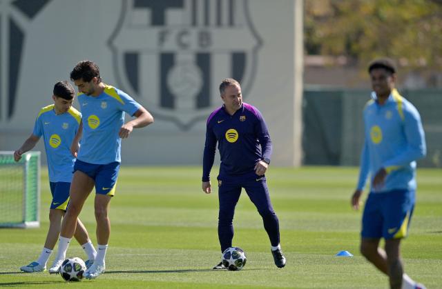 Barcelona's German coach Hans-Dieter Flick leads a training session on the eve of their UEFA Champions League quarter final football match against Club Atletico de Madrid at the Joan Gamper training ground in Sant Joan Despi, near Barcelona, on April 7, 2026. (Photo by MANAURE QUINTERO / AFP)